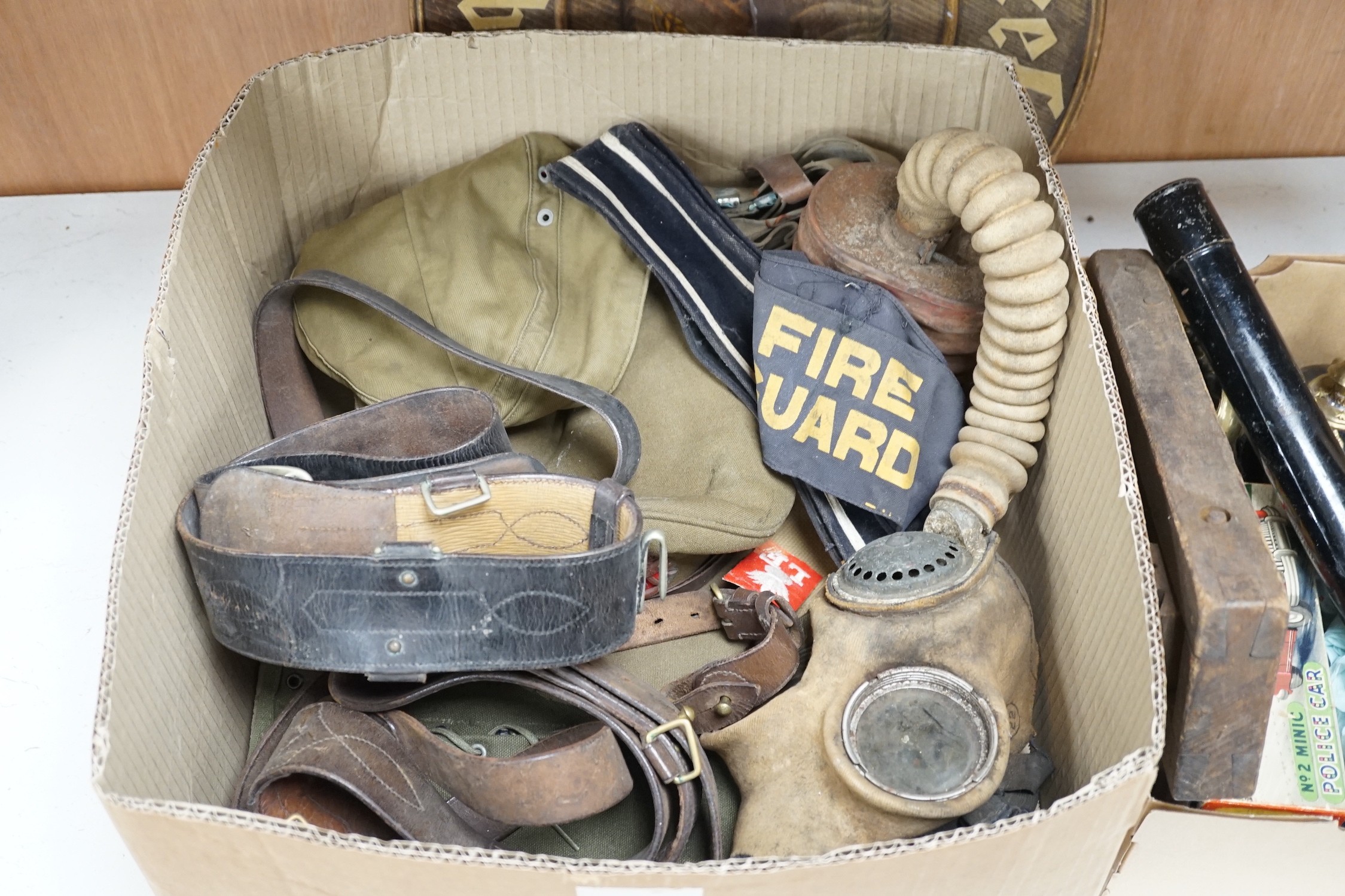 Wartime: a collection of military items and a boxed Triang Minic No. 2 Police car